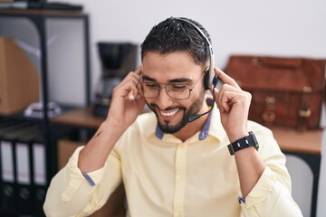 Sticker - Young arab man call center agent smiling confident working at office