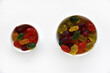 Delicious marmalade jelly bears candy in a package on a white background. A sweet snack in the form of jelly colorful delicious animals.