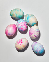 Tie Dyed Easter Eggs On White Surface
