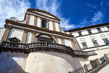 Wall Mural - Facade of an historic building with stone steps in the town of Gradoli