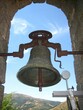 Vertical closeup shot of a church bell in Avila, Spain