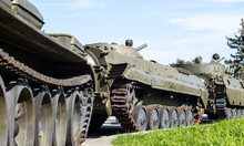 A Column Of Armored Vehicles And Tanks. National Armed Forces. Military Equipment And Troops. War In Ukraine. Building Or Building Combat Vehicles. Armored Weapons. Means Of The Armed Forces.