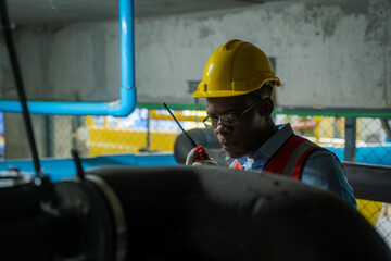 Fototapete - Engineer checking the water pipe system in the factory,Inspecting Water Valve For Leaks In Basement.