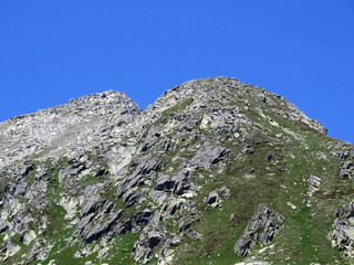 Rocky mountain peaks Poncione di Fieud (2696 m) and Fibbia (2738 m) in the massif of the Swiss Alps above the St. Gotthard Pass (Gotthardpass), Airolo - Canton of Ticino (Tessin), Switzerland (Schweiz