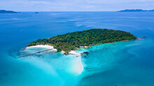 Koh Kham Trat Thailand, Aerial View Of The Tropical Island Near Koh Mak Thailand. White Sandy Beach With Palm Trees And Big Black Boulder Stones In The Ocean, Drone Aerial View Above Island