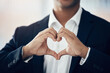 © Tashriq P/peopleimages.com - Businessman, hands and heart for love, thank you or symbol for message, icon or say for relationship. Romantic man with hand sign or voice in hearty shape emoji for loving, care or romance gesture