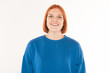 © Павел Костенко - Portrait of a young redhead girl with a blue jumper on a white background.