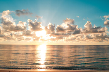 Sea beach with sky sunset or sunrise. Cloudscape over the sunset sea. Sunset at tropical beach. Nature sunset sky of sea. Dramatic clouds.