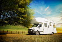 Motorhome, Caravan Or Campervan On Natural Background, Vanlife Concept, Road Trip Idea. High Quality Photo