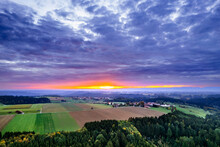 Germany, Baden-Wurttemberg, Dramatic Clouds Over Fields In Swabian-Franconian Forest At Sunrise