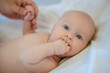 © zinkevych - Cute baby having a medical examination in the clinic