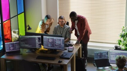 Sticker - Male CEO and Female CTO Talking to Software Engineer Team Lead In Creative Office Space. Black Entrepreneur and Caucasian Business Partner Offering New Features For Their Innovative Online Service.