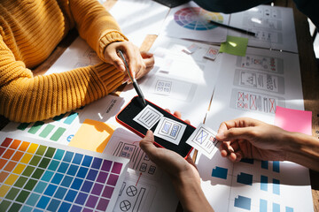 ux Graphic designer creative sketch planning application process development prototype wireframe for web mobile phone . User experience concept.