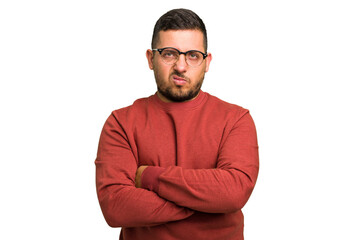 Canvas Print - Young caucasian man isolated frowning face in displeasure, keeps arms folded.