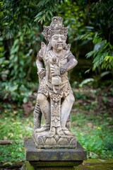 Sticker - Vertical closeup of ancient statue in a temple in Bali, Indonesia