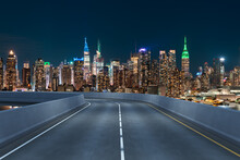 Empty Urban Asphalt Road Exterior With City Buildings Background. New Modern Highway Concrete Construction. Concept Of Way To Success. Transportation Logistic Industry Fast Delivery. New York. USA.