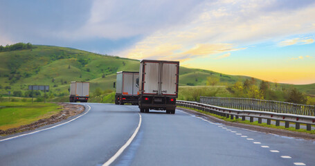 Poster - Truck Convoy Moves on a Country Road