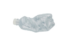 Crumpled Plastic Bottle Isolate. The Concept Of The Use And Recycling Of Plastic.