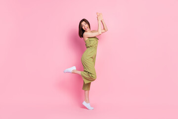 Wall Mural - Full length photo of glad overjoyed girl arms palms applauds look camera rejoice shopping sale isolated on pink color background