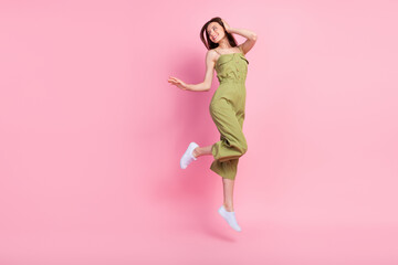 Canvas Print - Full length photo of positive cute lady dressed stylish clothes rejoice glad interested look empty space isolated on pink color background