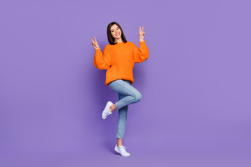 Sticker - Full length photo of cheerful charming girl hands fingers demonstrate v-sign isolated on violet color background