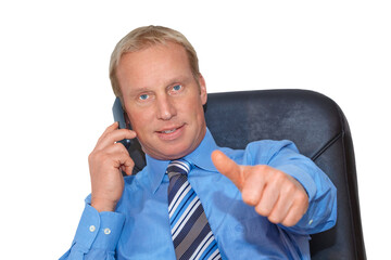 Wall Mural - gesture series: businessman gets positive message by cell phone. thumbs up.
