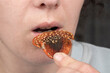 © Fukume - a woman treatment a microdose of fly agaric, eat a hat dried red amanita muscaria
