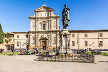 Wall Mural - florence, italy. church of san marco (xiii century) and a monument to general manfredo fanti