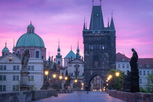 Colorful Sunrise At Historical City Centre, Charles Bridge Lined With Street Lamps, Prague, Czechia
