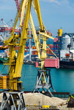 Industrial Seaport Infrastructure, Sea, Cranes And Dry Cargo Ship, Grain Silo, Bulk Carrier Vessel And Grain Storage Elevators, Concept Of Sea Cargo Transportation