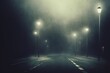 © YNYS - A moody double expsoure concept of a hooded figure over layered on a straight road with street lights on a foggy winters night. With a grunge, abstract, edit