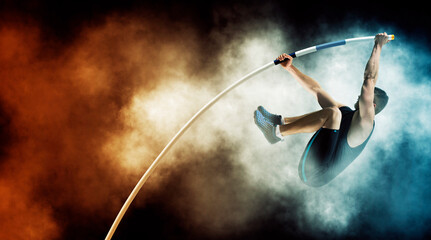 Wall Mural - Professional pole vaulter training on smoke background