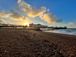 Brighton, Sussex, England, Angleterre, Great Britain, seafront, pier, sunset on the beach