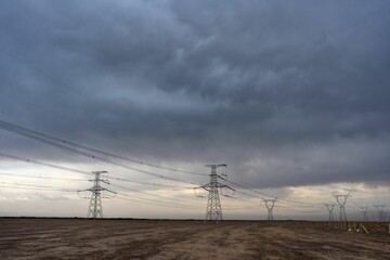 Sticker - Masts of the power line against the cloudy sky