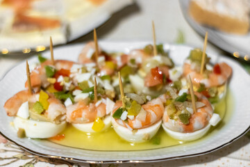 egg, shrimp and vinaigrette skewers prepared for the celebration dinner