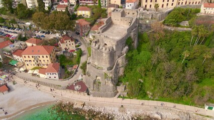 Wall Mural - Aerial video of the Forte Mare Fortress in the center of Herceg Novi, a coastal city at the entrance to the Boka Kotor Bay. Travel destinations of Montenegro