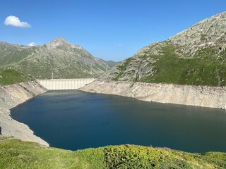 Artificial reservoir lake Lago di Lucendro or accumulation lake Lucendro in the Swiss alpine area of the St. Gotthard Pass (Gotthardpass), Airolo - Canton of Ticino (Tessin), Switzerland (Schweiz)