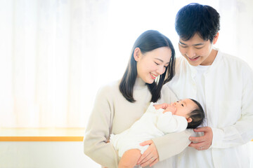 Family portrait in backlight with copy space at left