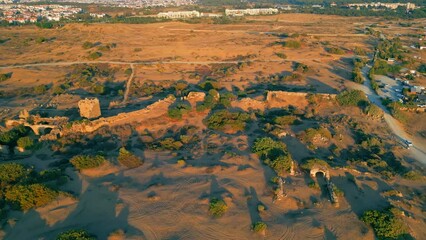 Wall Mural - aerial view of desert-like place near the Turkish city, sand and bushes. High quality 4k footage