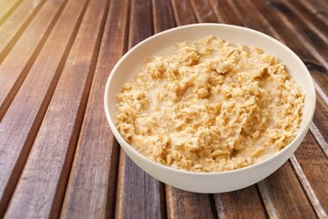 Sticker - Traditional tasty oatmeal food in plate