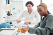 © C D/peopleimages.com - Office building, engineering and global architecture team coworking in collaboration on a floor plan. Productivity, diversity and designers with a mission, goals and our vision planning a project