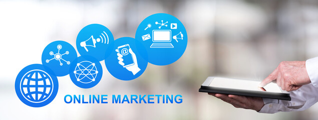 online marketing concept with man using a tablet