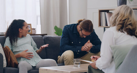 Wall Mural - Pregnant woman, man and fight with psychologist, counseling and mental health argue about problem. Couple, stress in support therapy in psychology office to discuss mistake, fail and marriage divorce