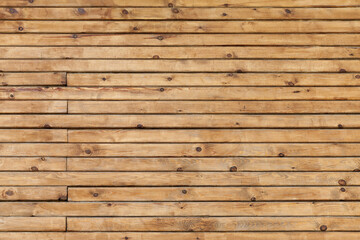 Wall Mural - Wooden wall made of uncolored planks, background texture