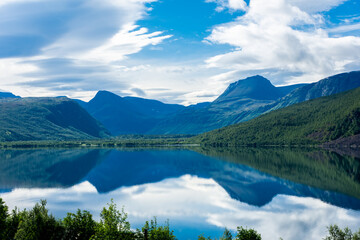 Wall Mural - Reflection on a beutiful lake in  Norway