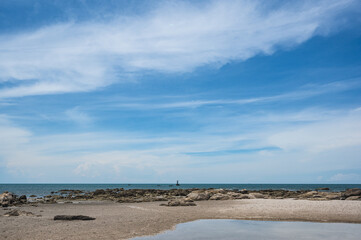 Wall Mural - Landscape view of huahin beach with endless horizon at Prachuap Khiri Khan thaailand.