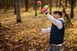 © AS Photo Family - Autumn outdoor portrait of boy play with catch and toss ball game.