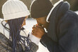 © prostooleh - African american couple in a winter forest