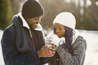 © prostooleh - African american couple in a winter forest