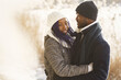 © prostooleh - African american couple in a winter forest